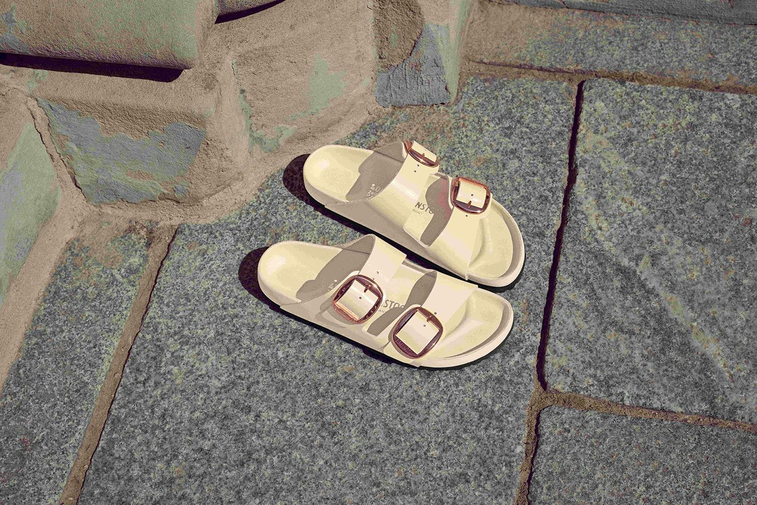 Birkenstock's Arizona sandal in black leather with gold buckles