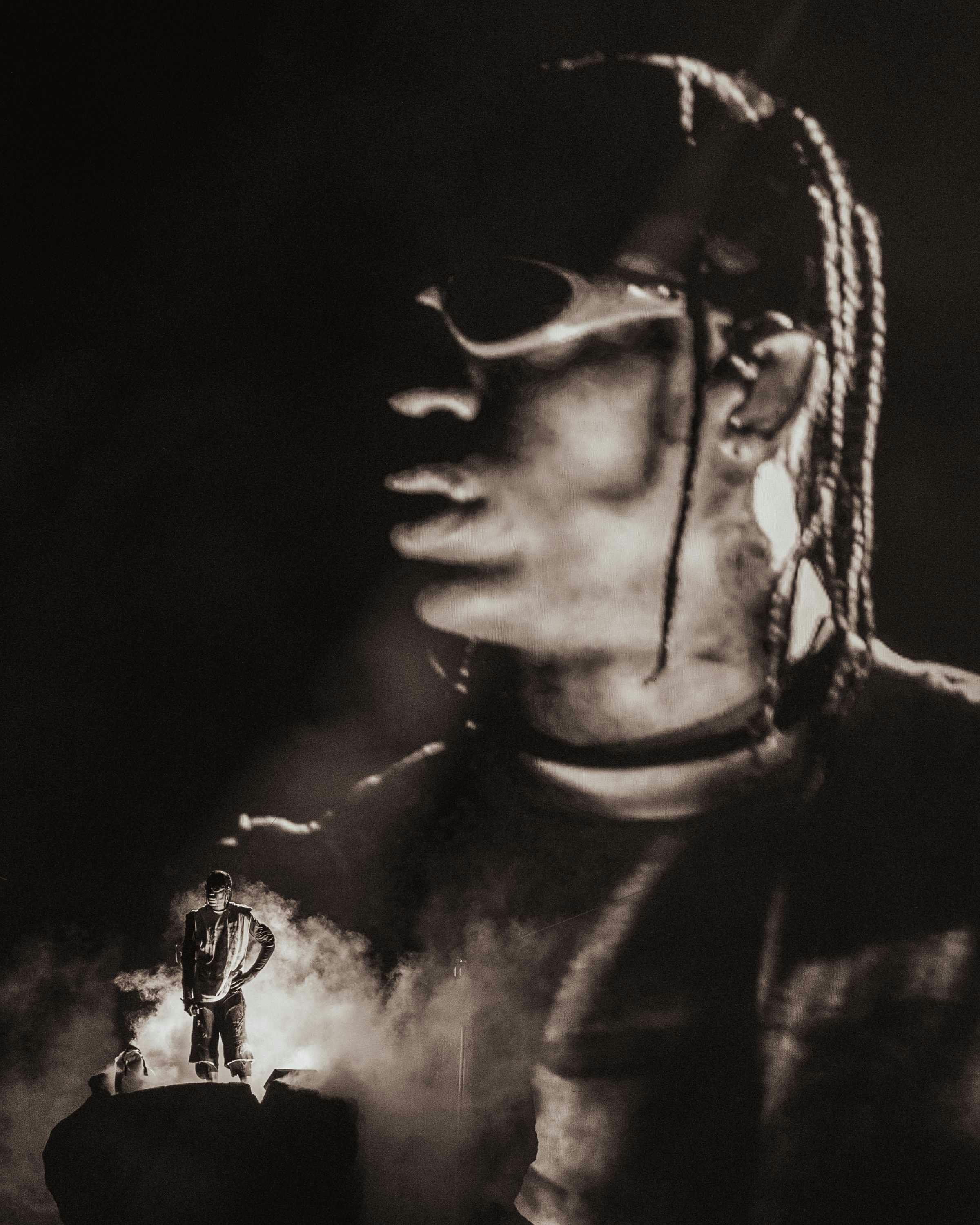 Travis Scott wears oakley sunglasses while performing live during circus maximus tour