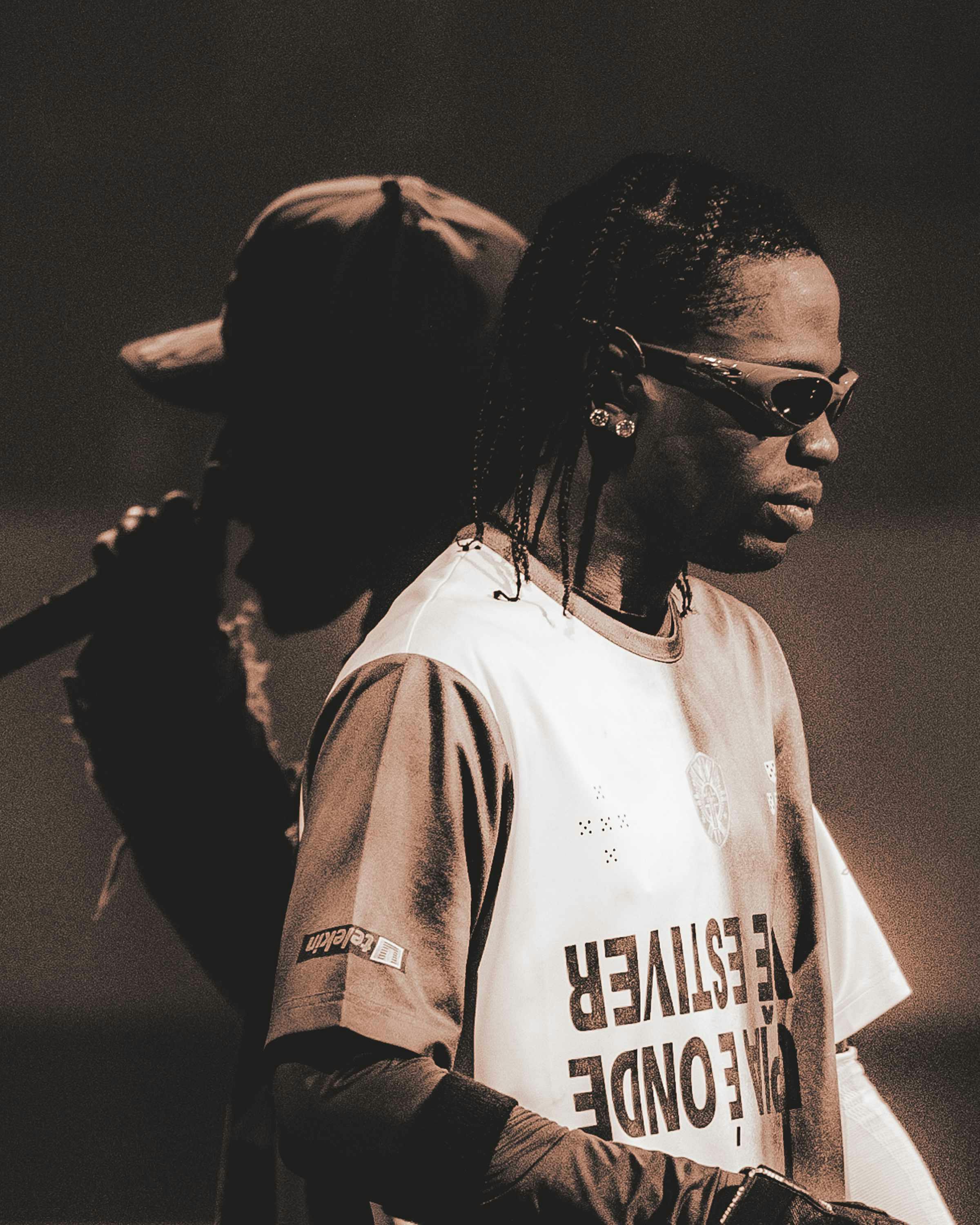 Travis Scott wears oakley sunglasses while performing live during circus maximus tour