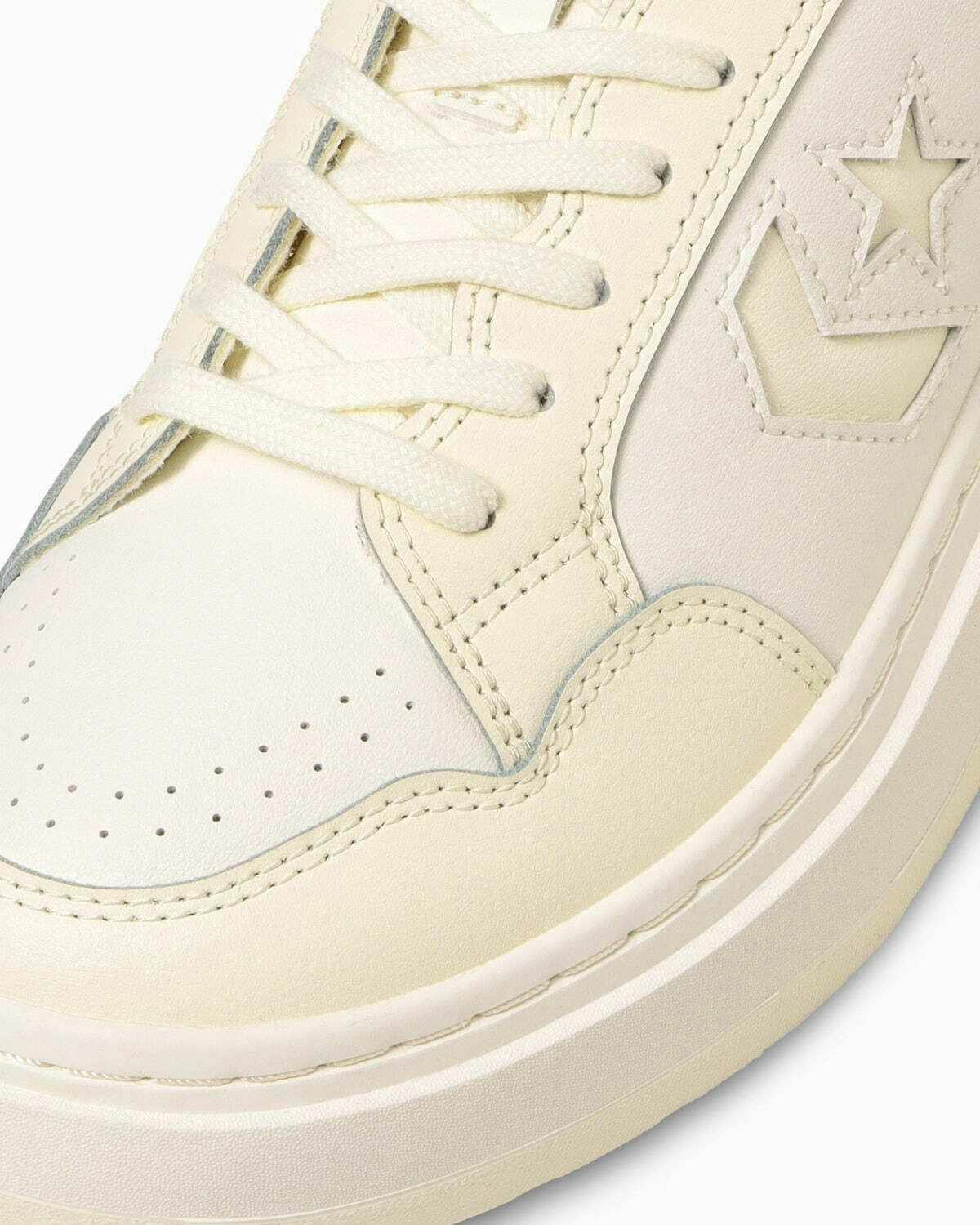 Converse Weapon PLTS Ox sneaker in low-top white and cream colorways