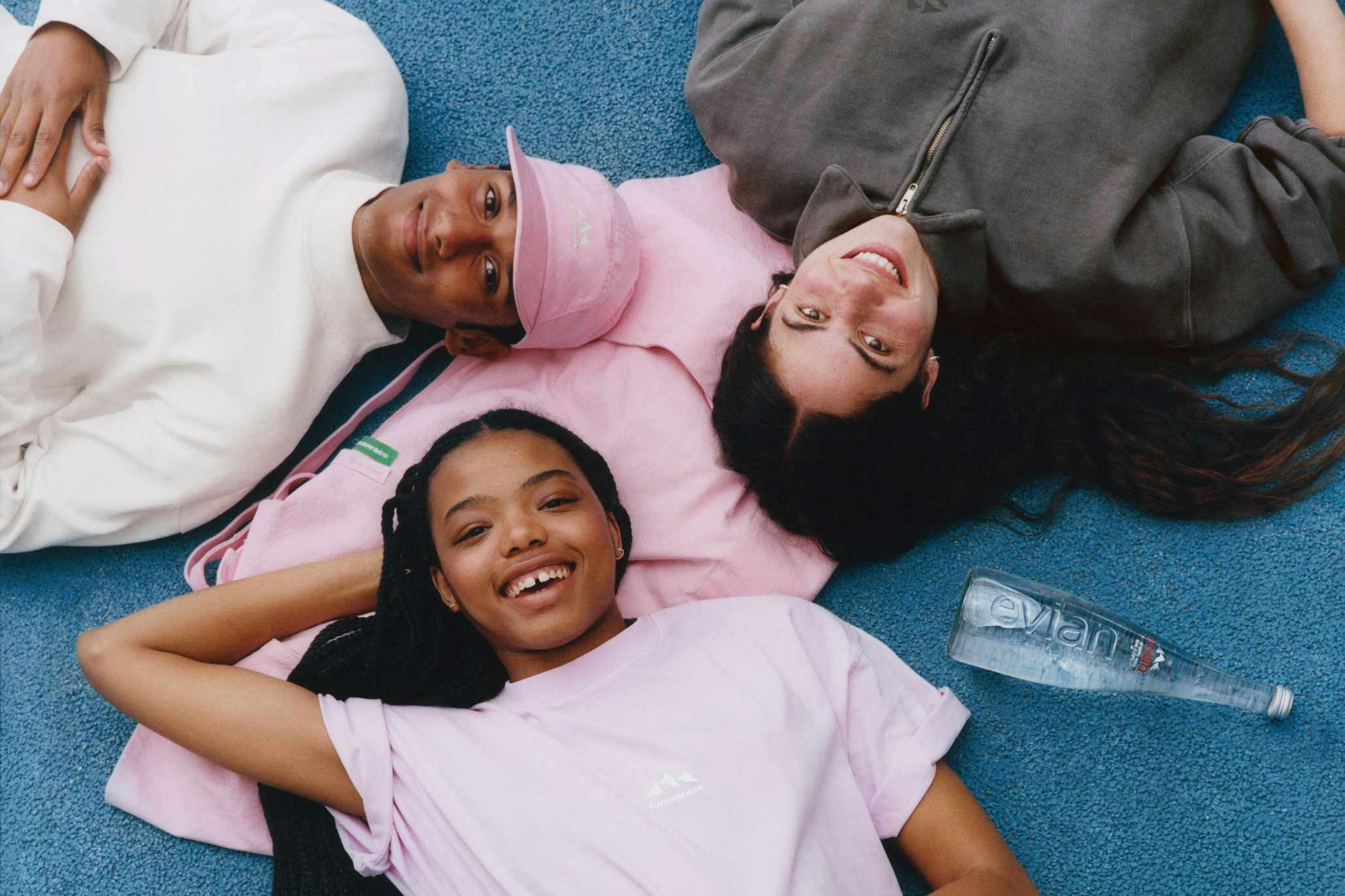 pharrell's evian x humanrace clothing collection collab, including sweaters, shirts and bags