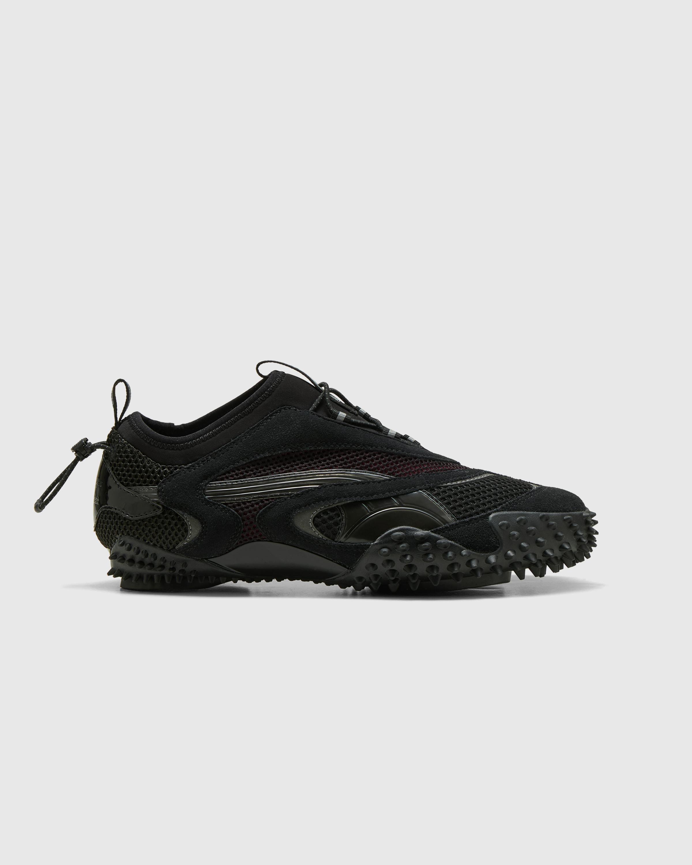 Puma x Aries – Mostro AC Aries Arise PUMA Black/Dark Jasper - Low Top Sneakers - Black - Image 1