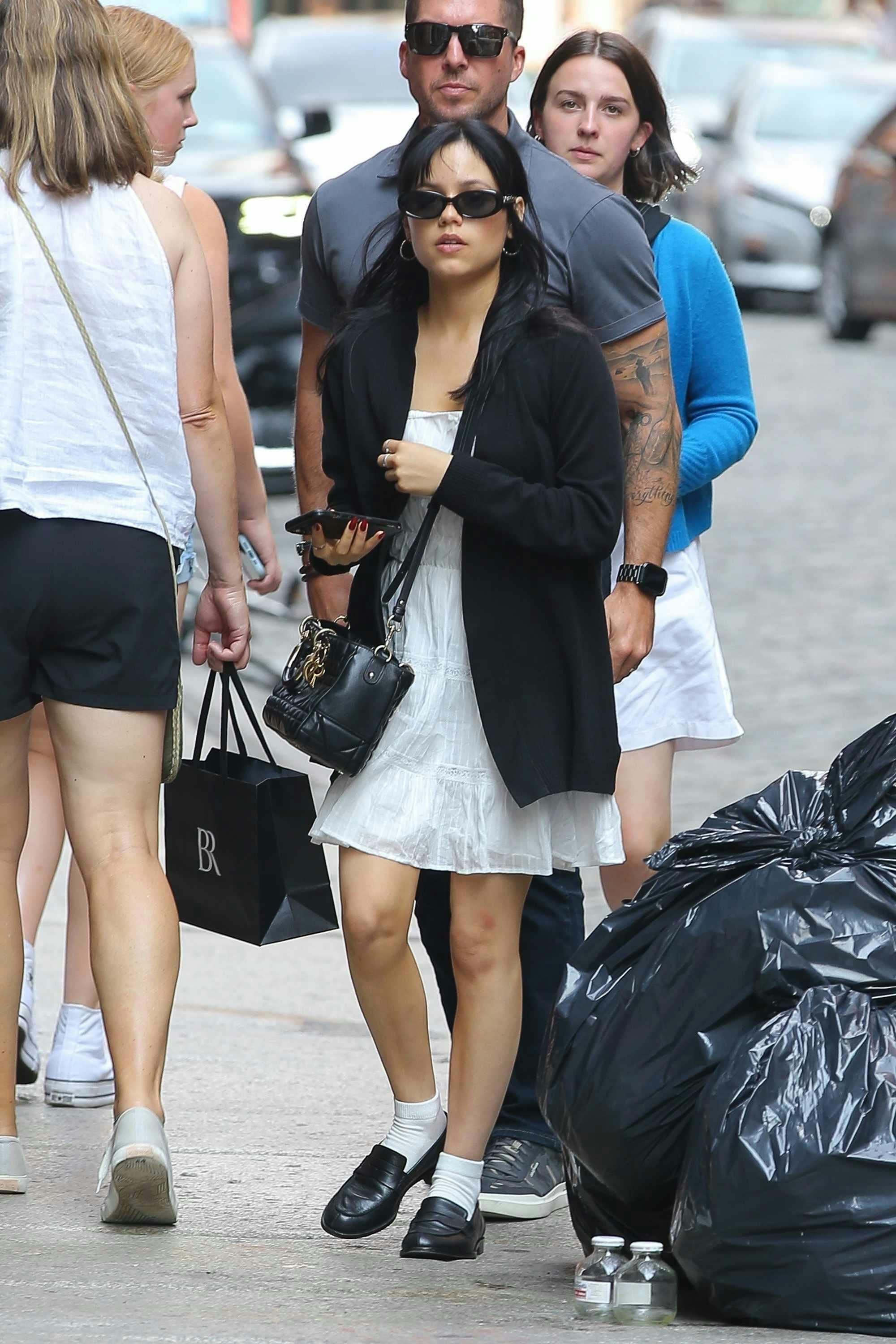 Jenna Ortega wears black clothes and sunglasses for the Beetlejuice 2 press tour in New York