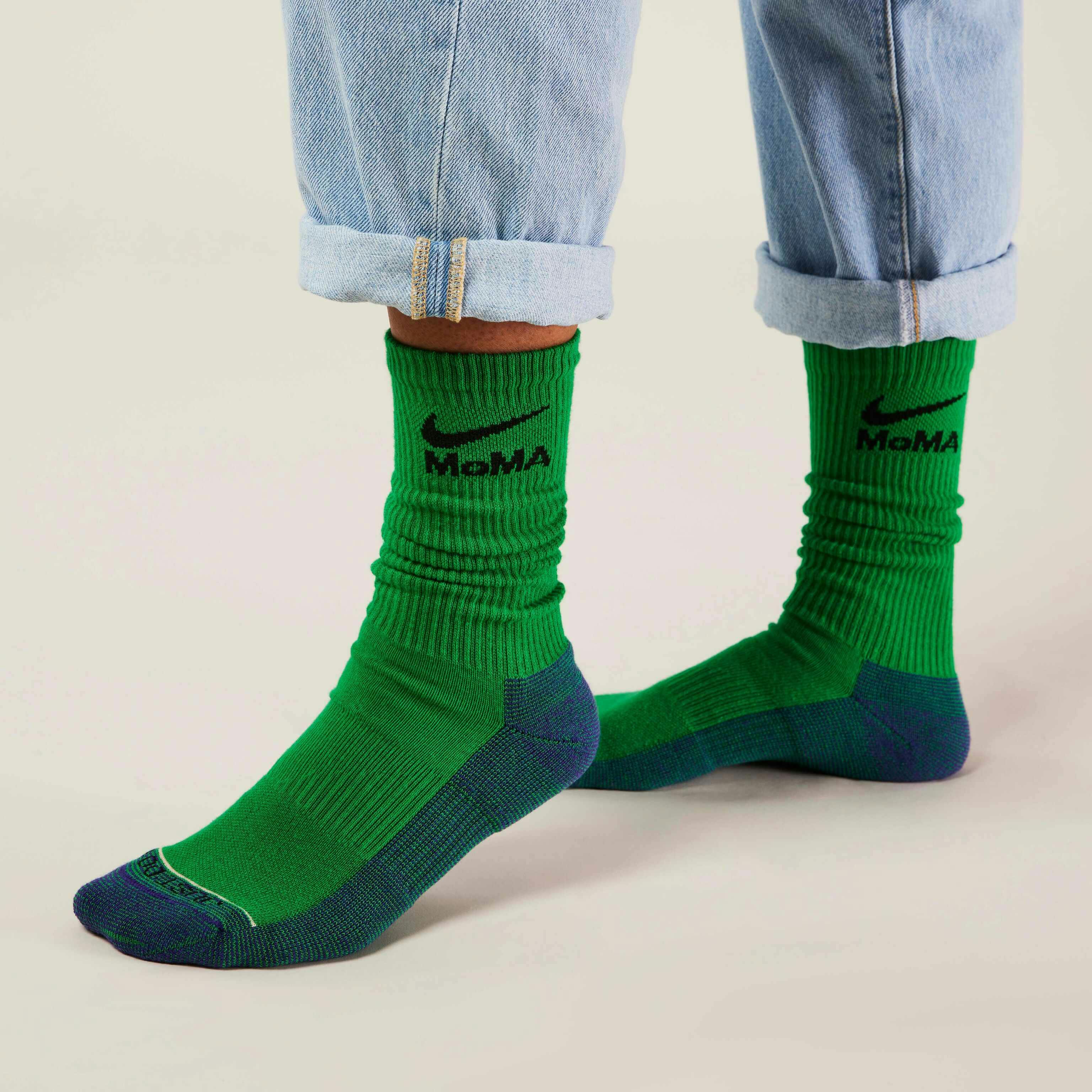 MoMA x Nike sock collaboration in white yellow green blue pink