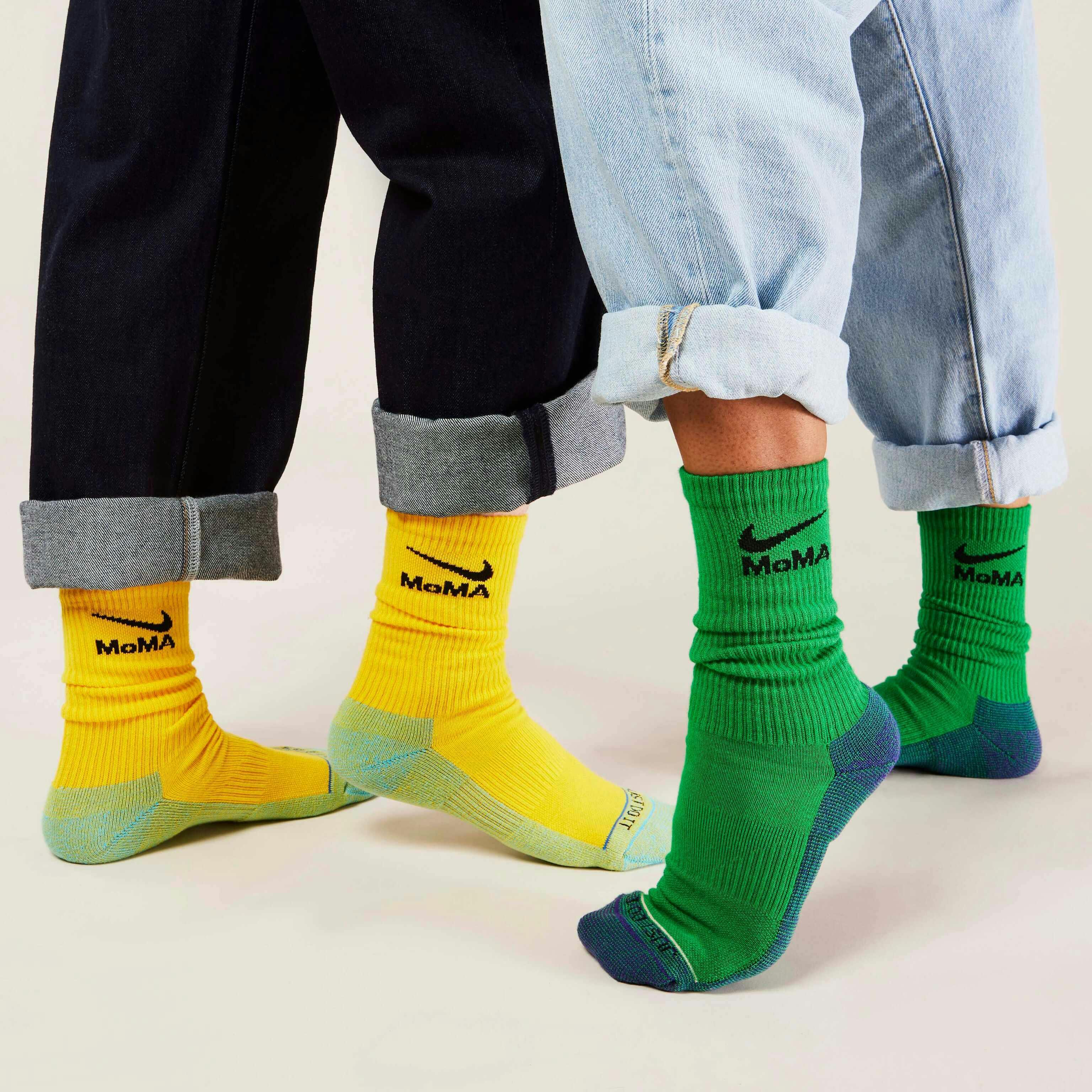 MoMA x Nike sock collaboration in white yellow green blue pink