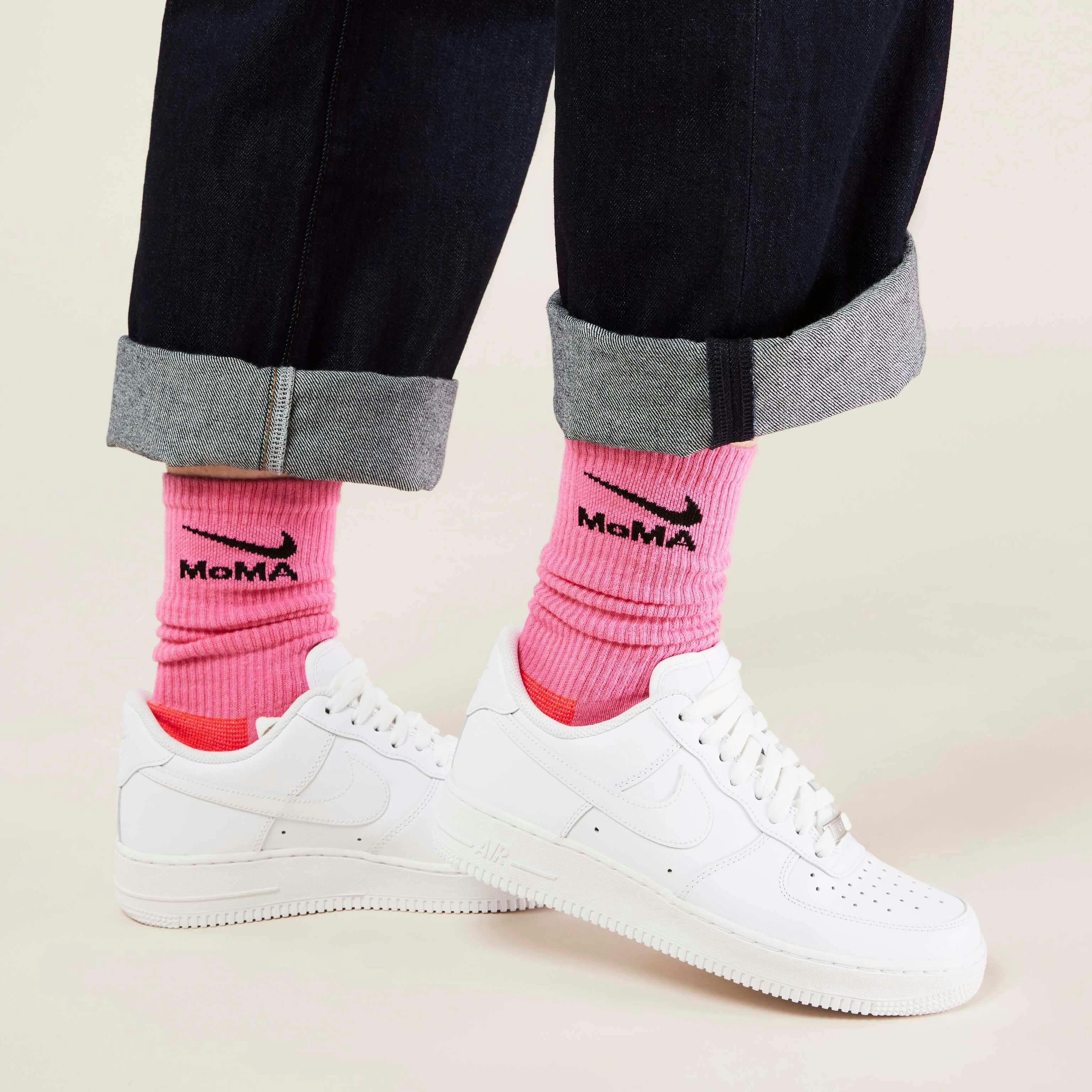 MoMA x Nike sock collaboration in white yellow green blue pink