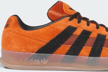 Orange adidas aloha skat sneakers