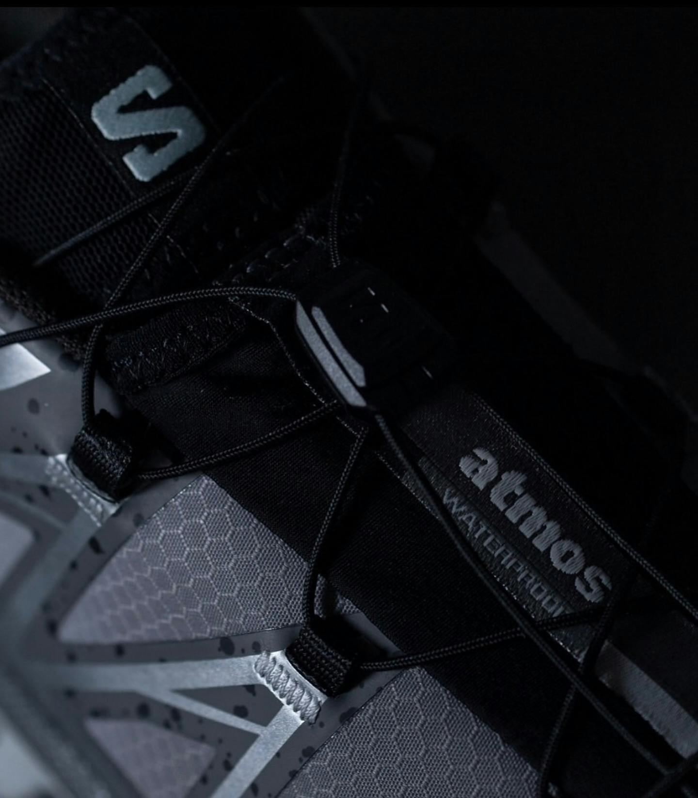 black and gray salomon sneaker