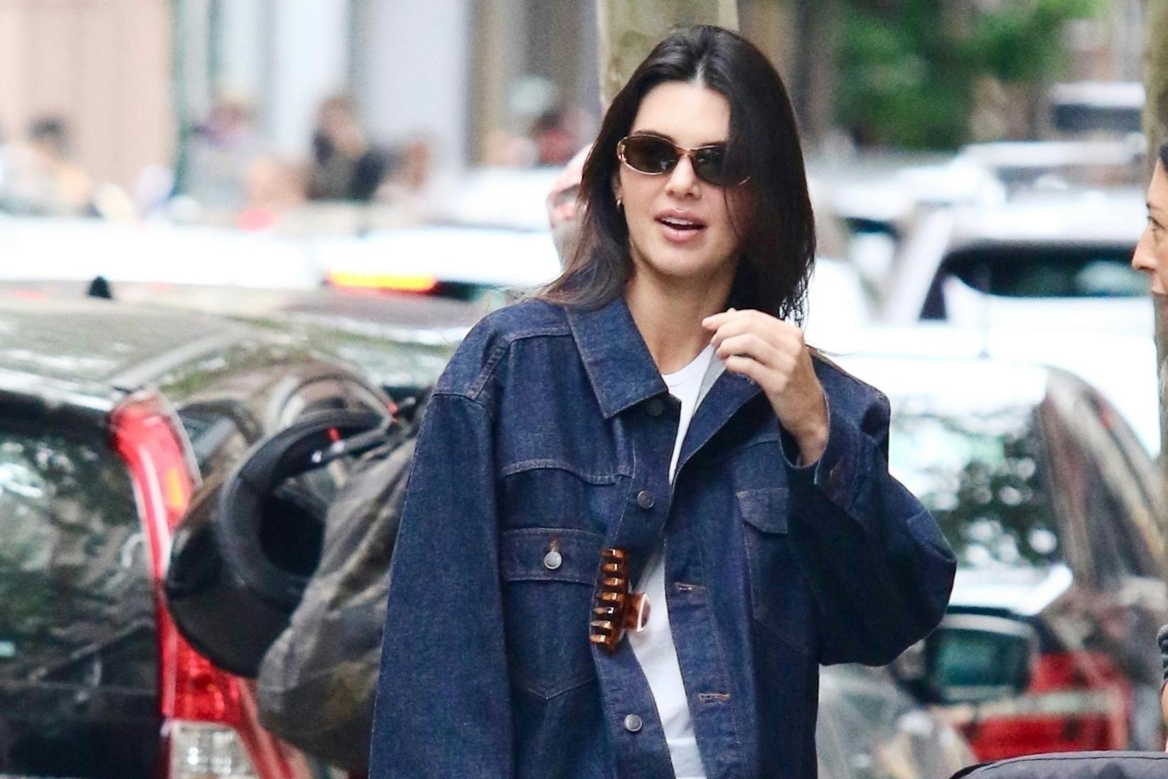 Kendall Jenner wearing a denim jacket and jeans Canadian Tuxedo in New York City