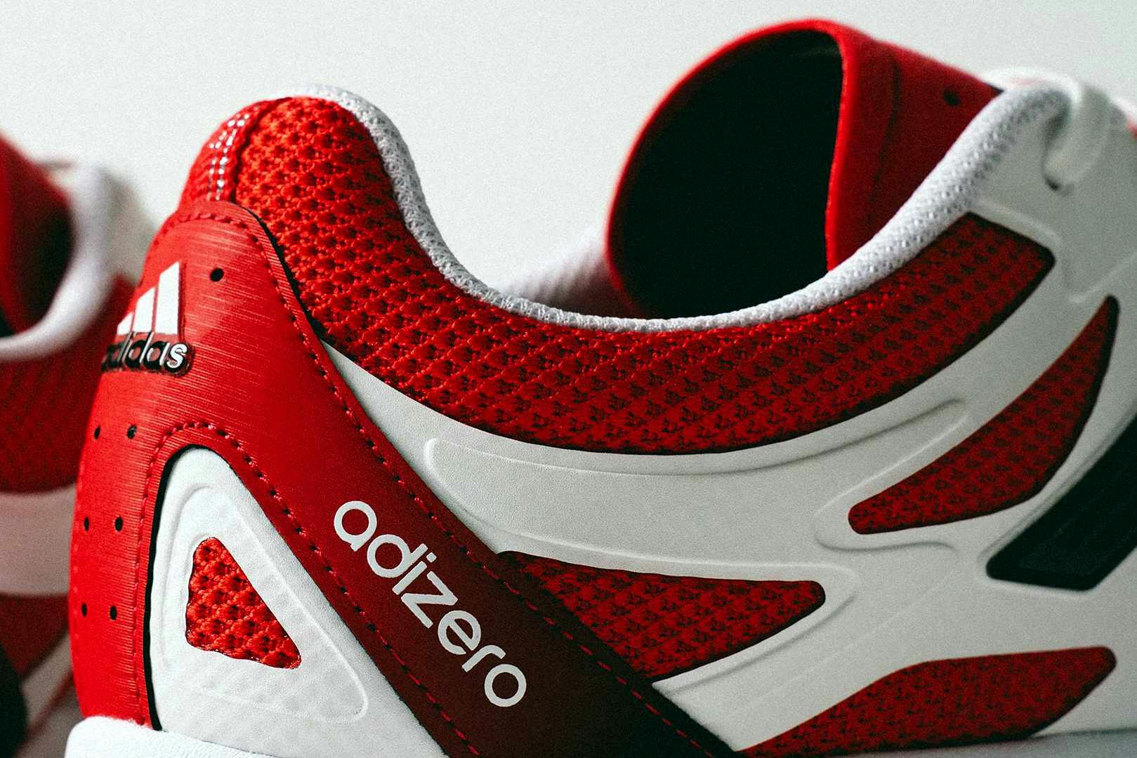 adidas adizero pr sneaker in red and white