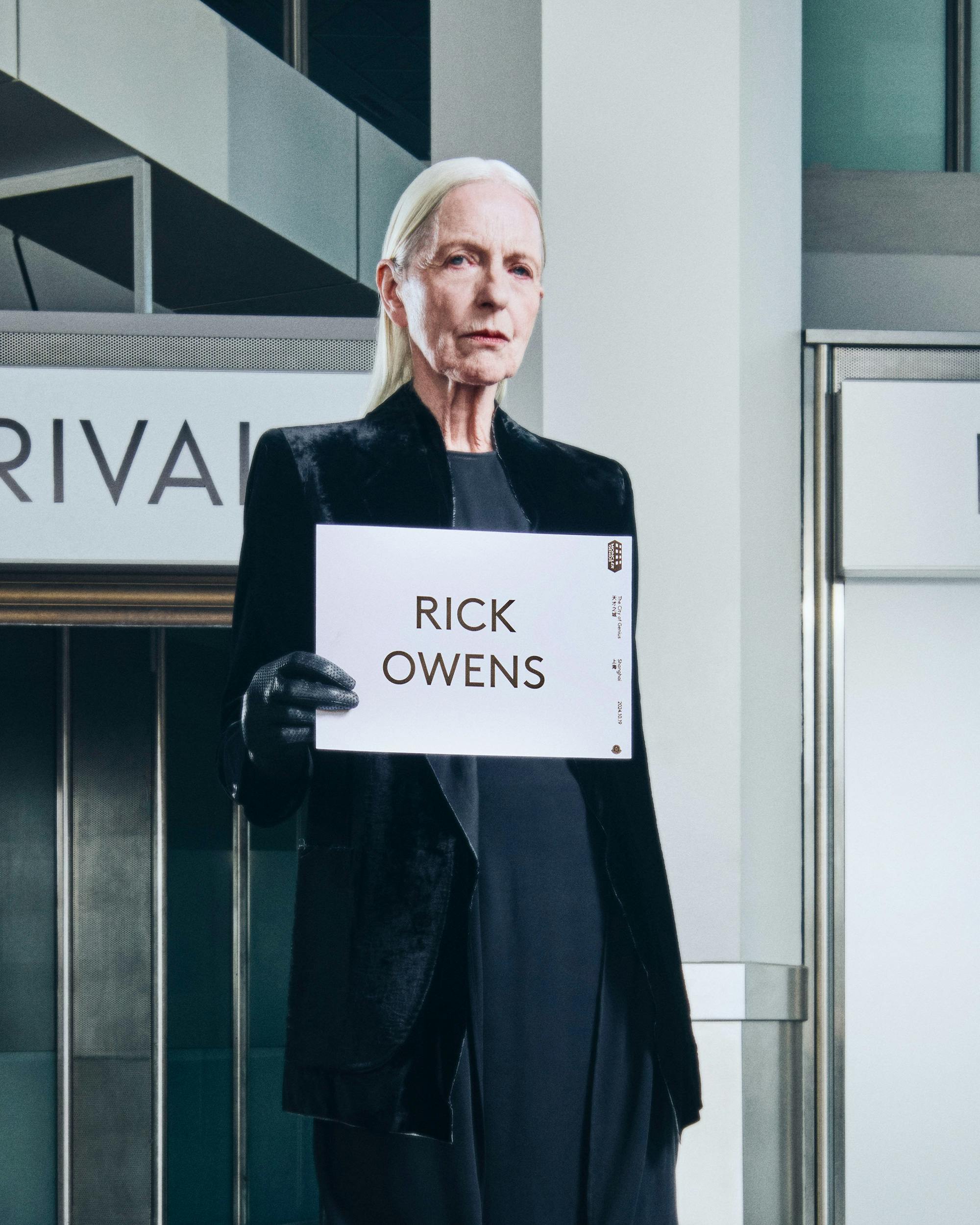 Moncler drivers holding name card with talent name to pick them up from airport