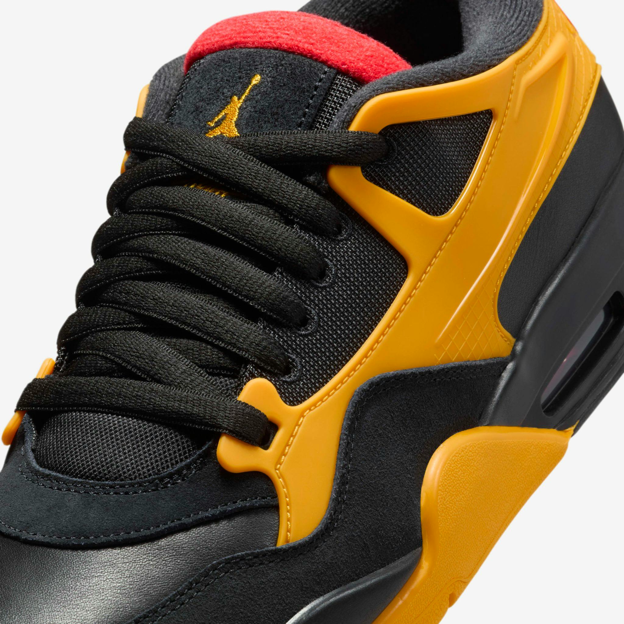 Black and yellow nike jordan 4 RM