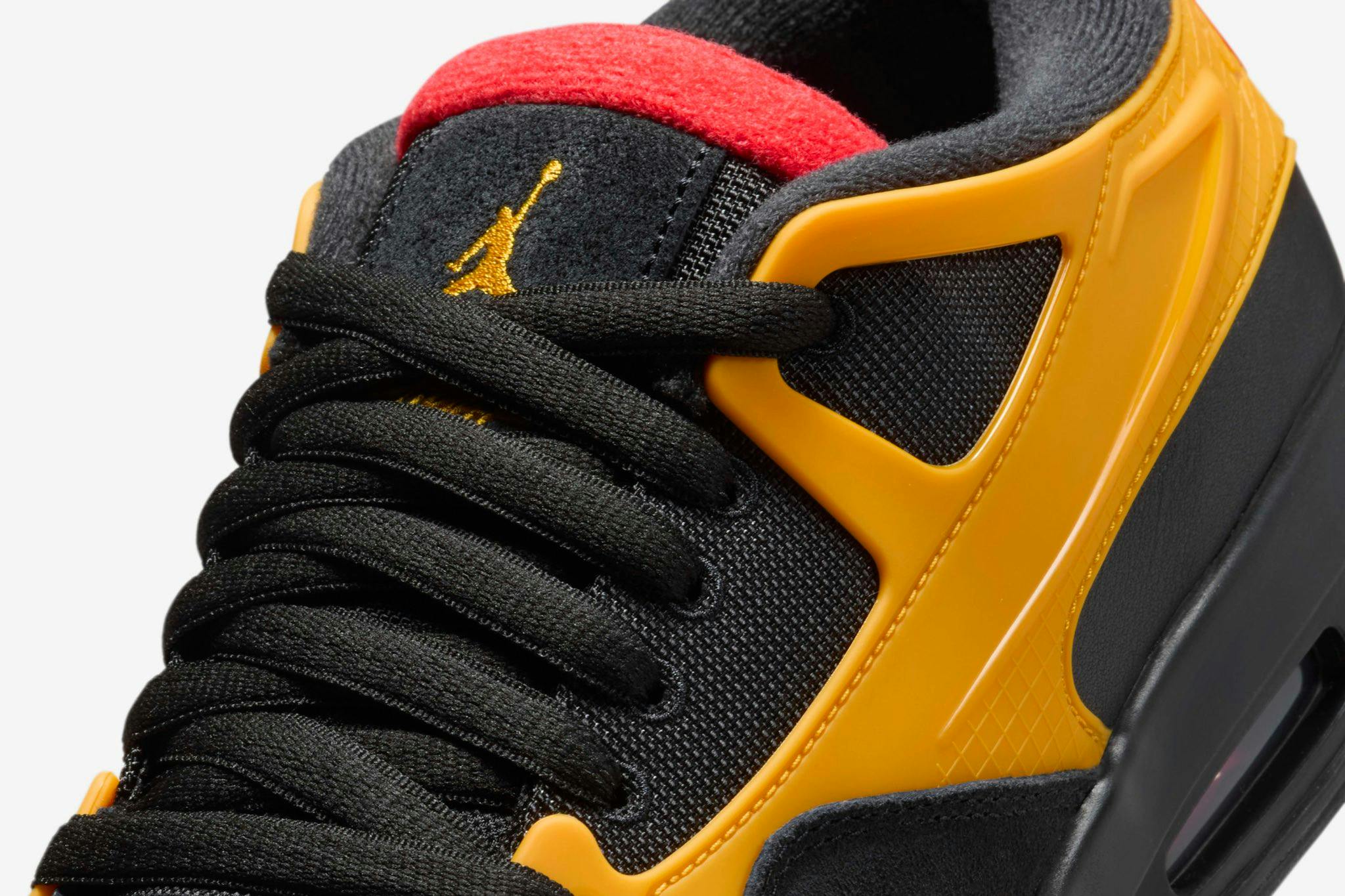 Black and yellow nike jordan 4 RM