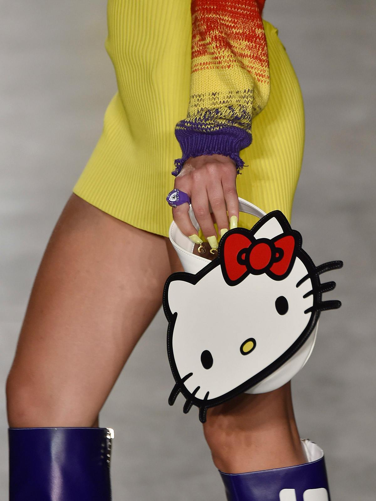 A model carrying GCDS’ Spring/Summer 2019 Hello Kitty purse.