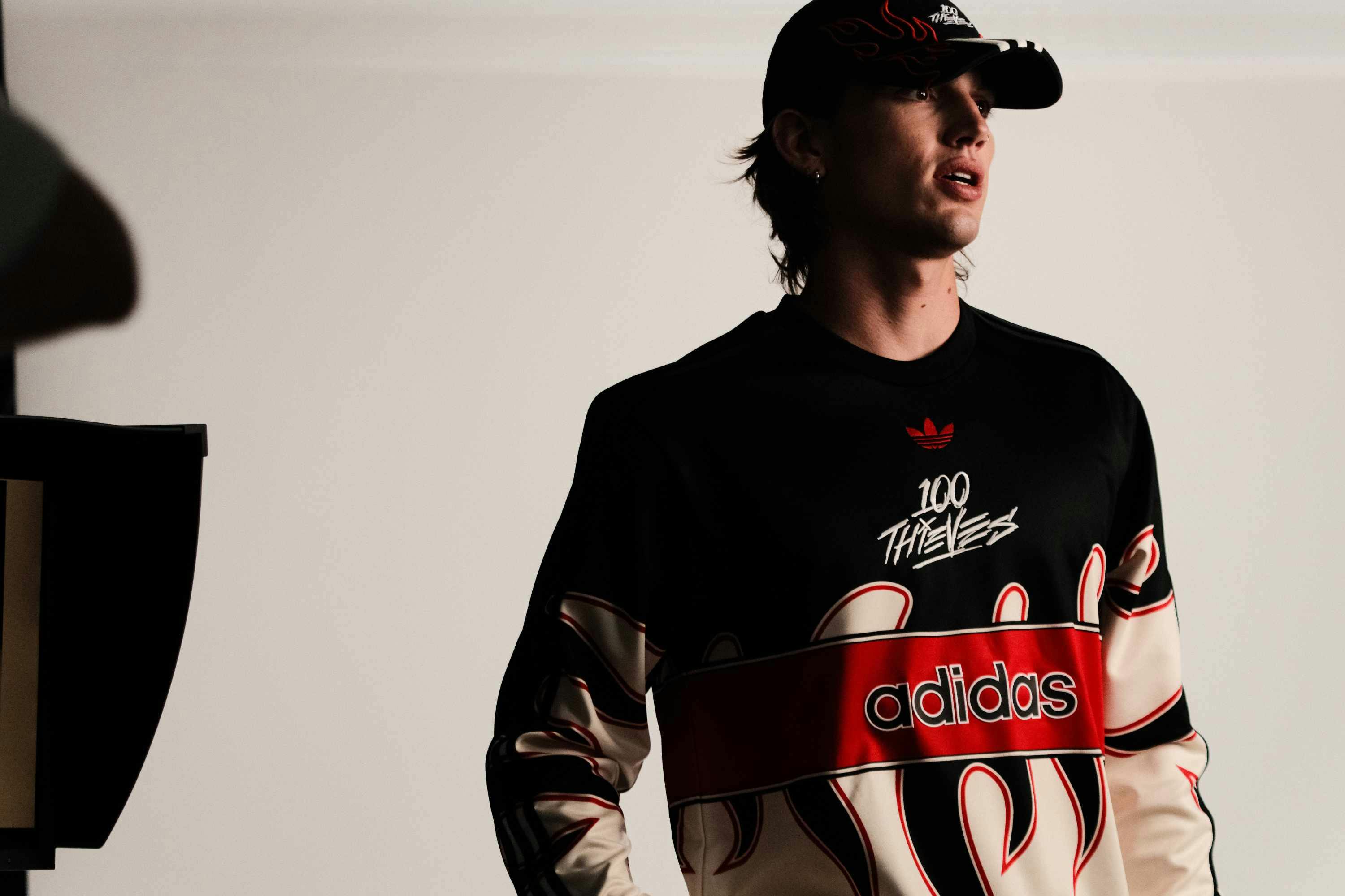 100 thieves adidas fw24 collection collab in black and red with samba sneakers