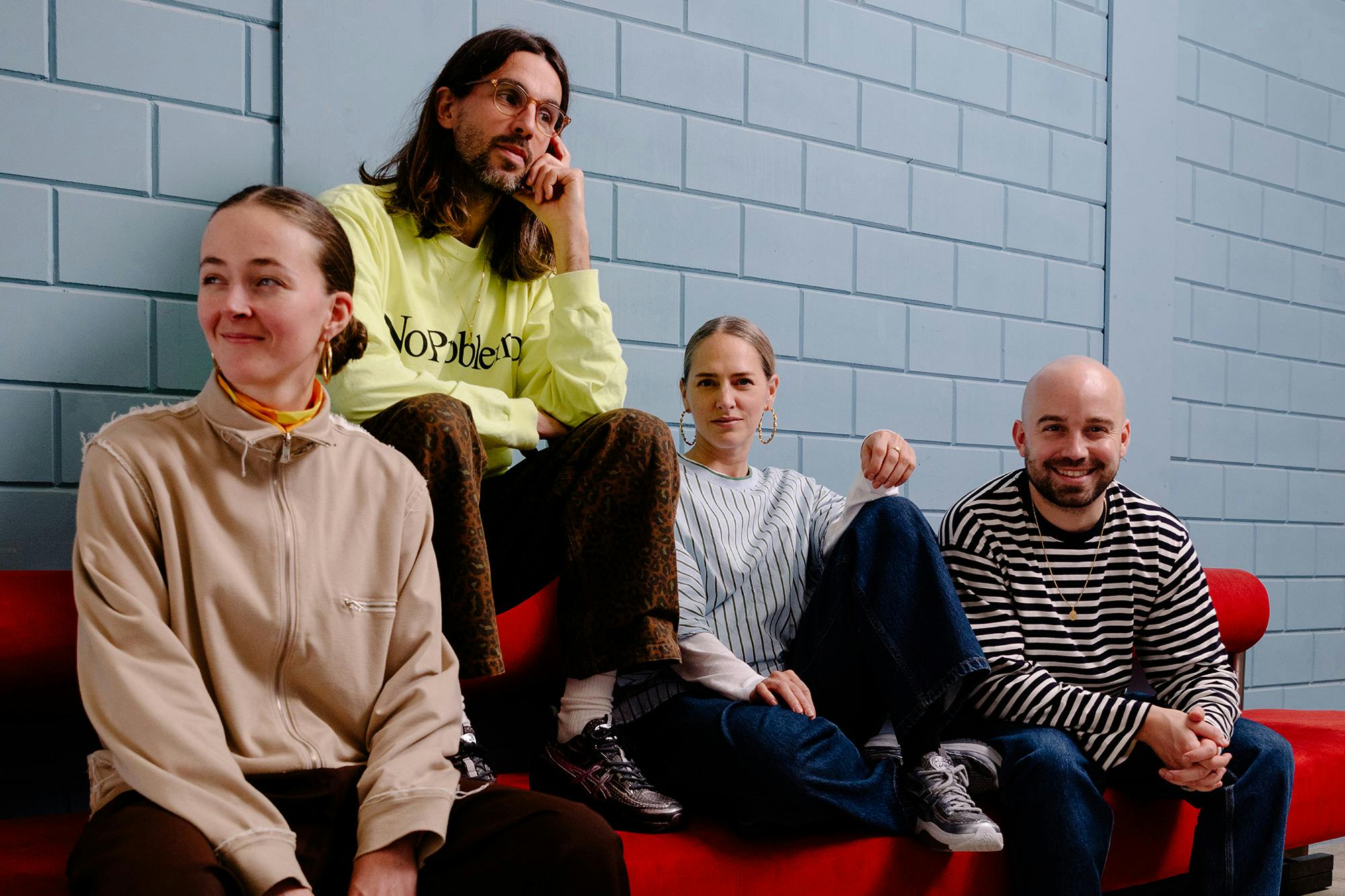 The full HAGEL team sitting on a sofa