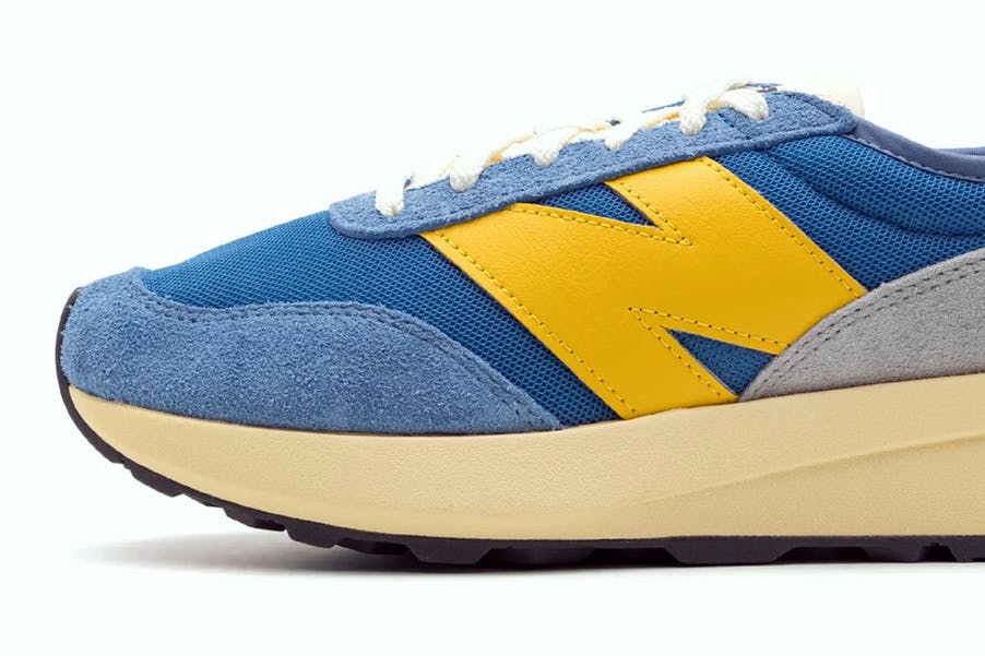 new balance 370 sneaker yellow blue colorway