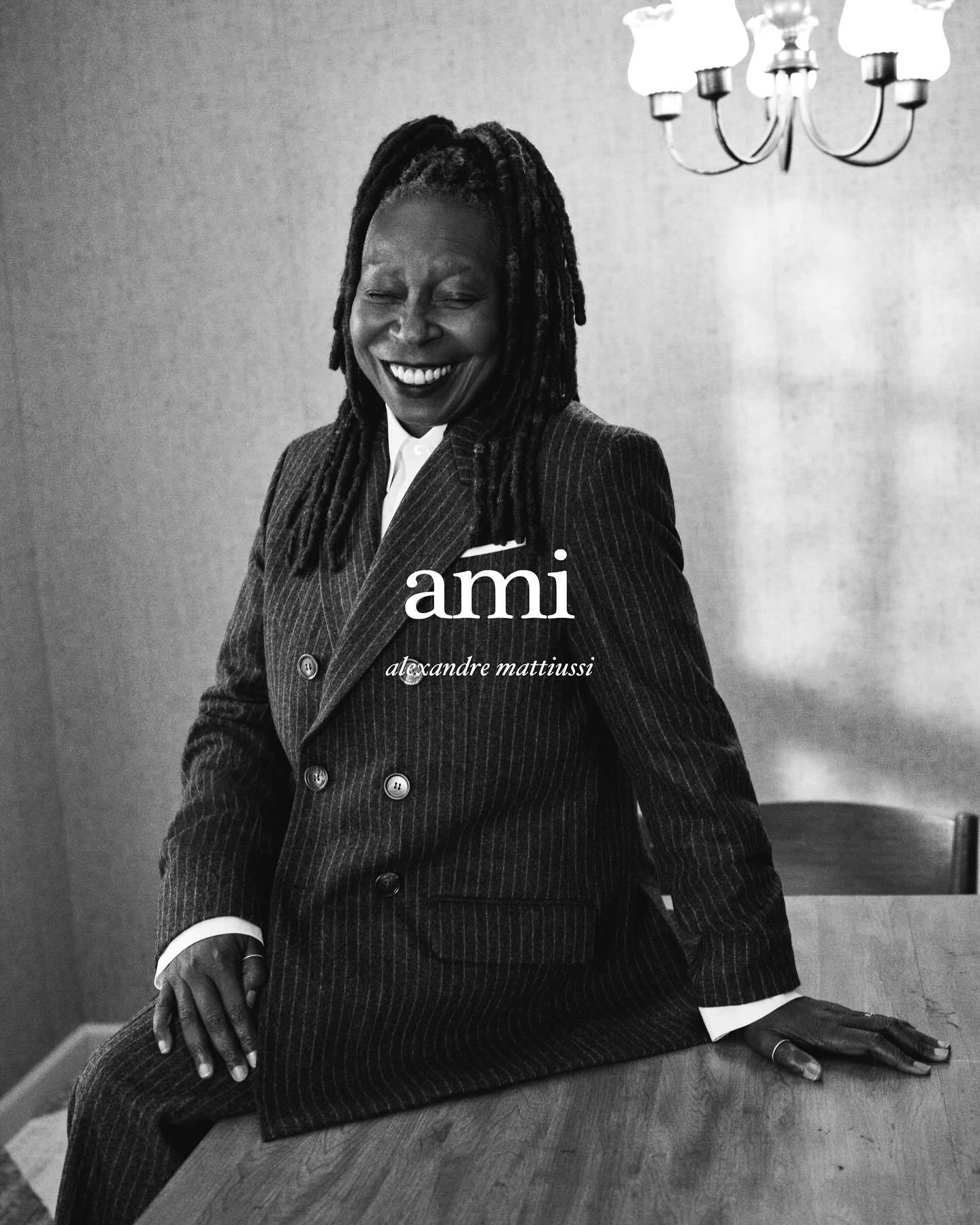 whoopi goldberg wearing an ami striped suit