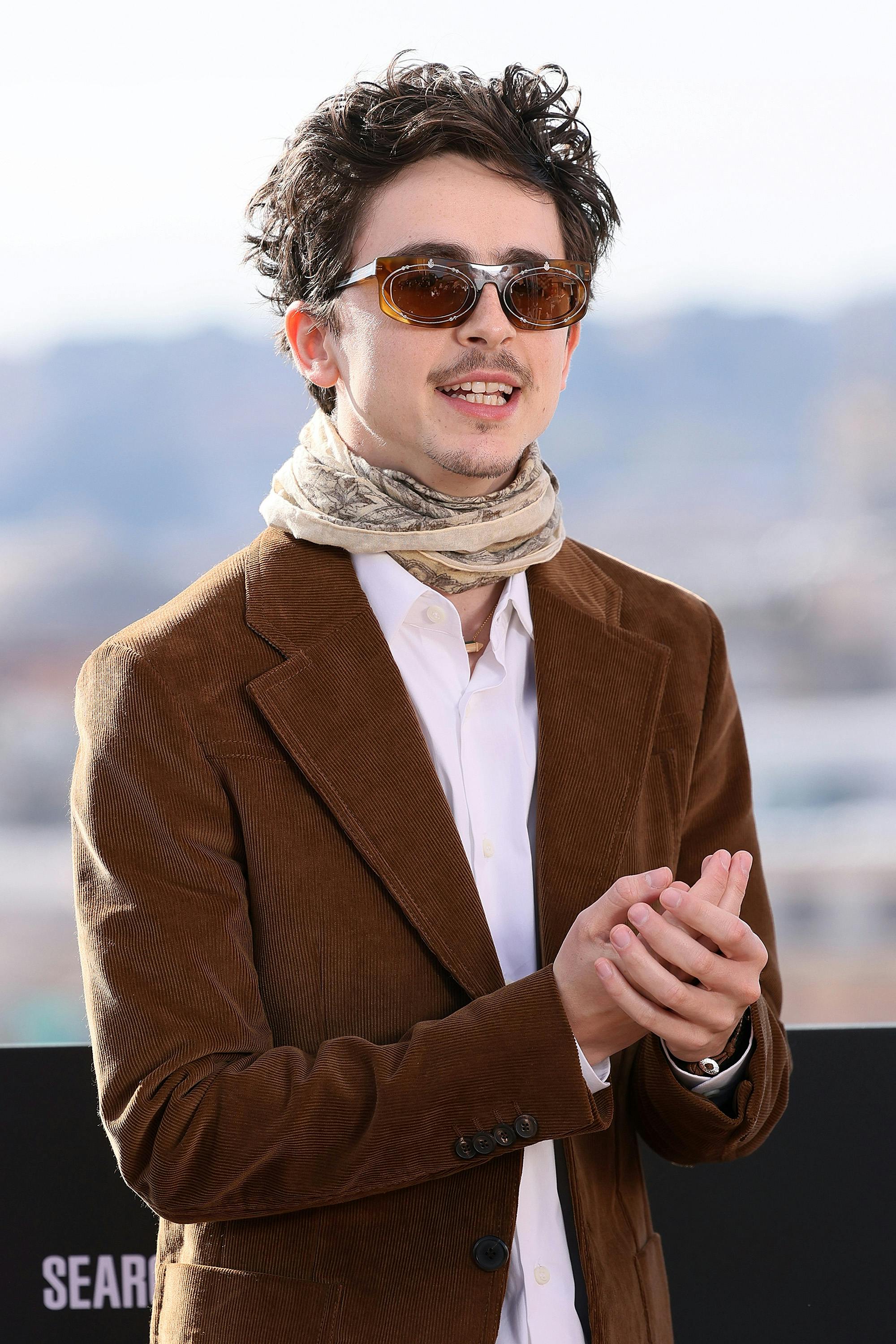 Timothee Chalamet Style Bob Dylan Movie Biopic Press Tour Red Carpet Luxury Fashion Celebrity Accessories Trends Elle Fanning A Complete Unknown