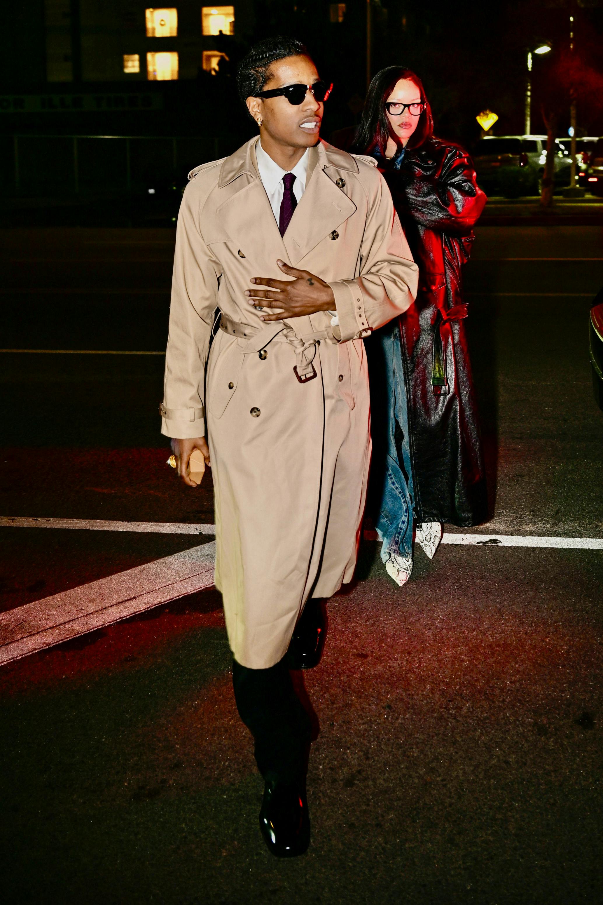 asap rocky wears a beige trench coat to his los angeles gun trial