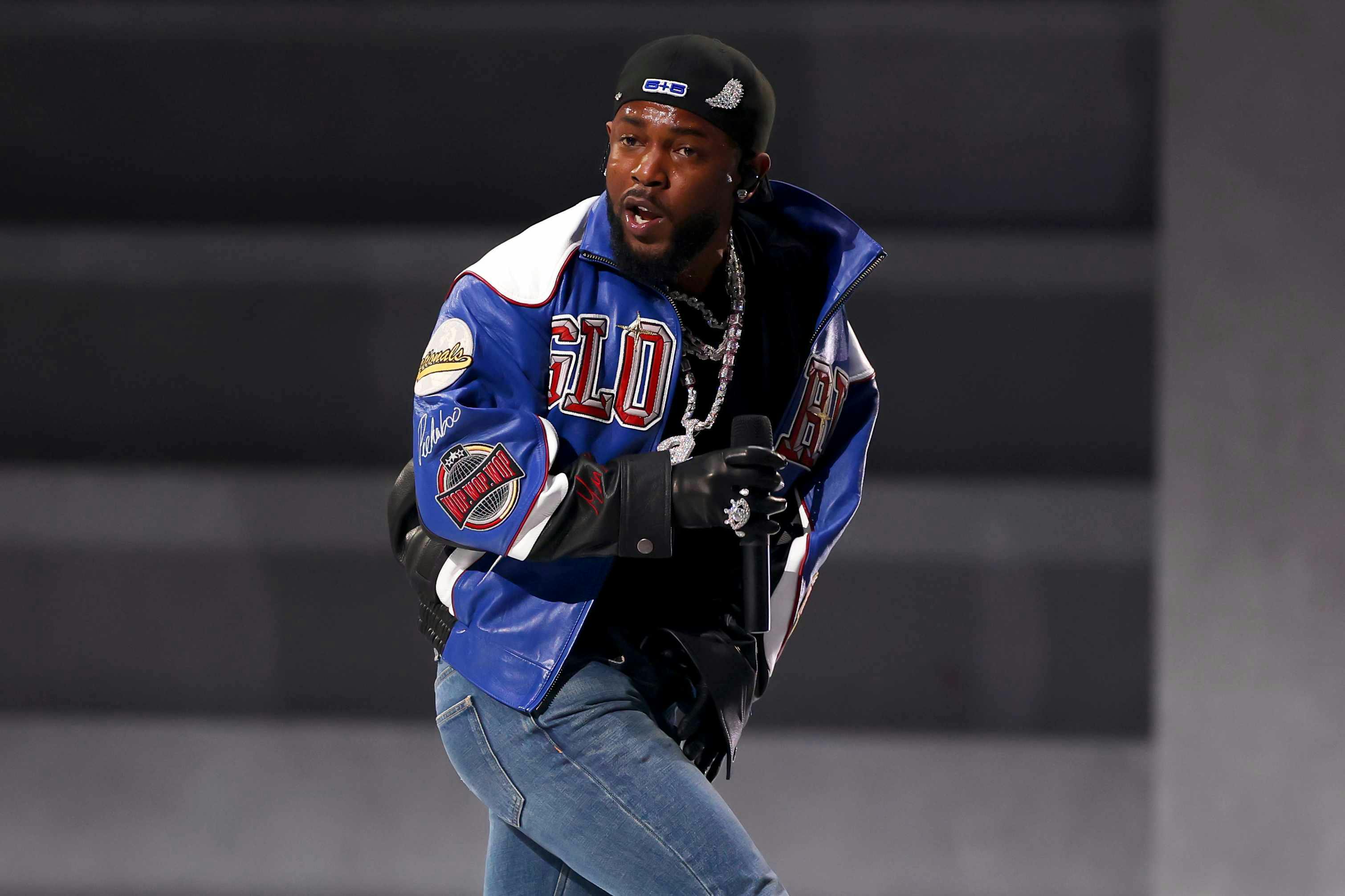 kendrick lamar wears martine rose jacket and flared celine jeans