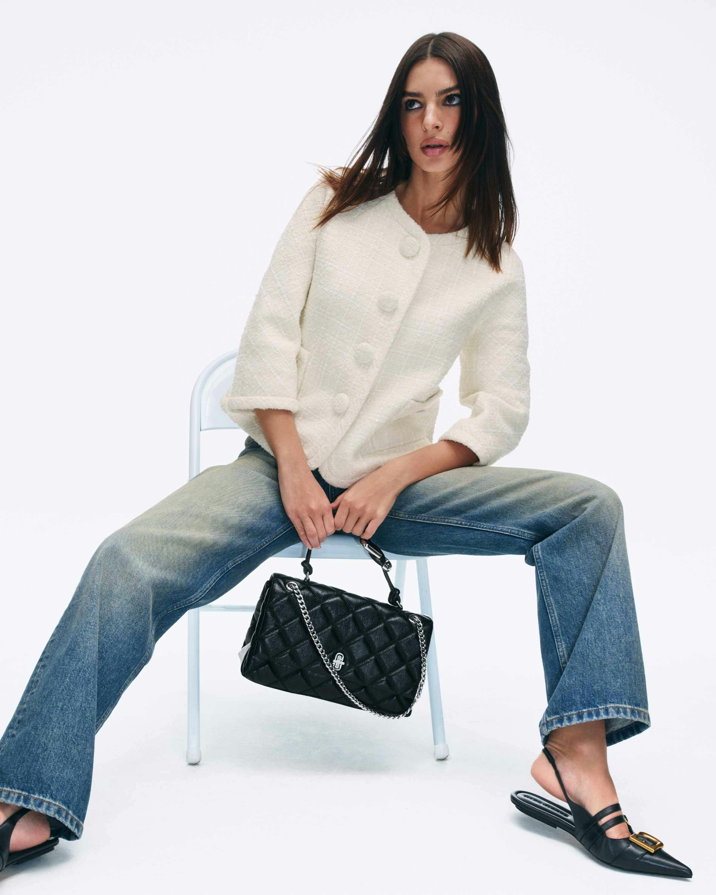 emily ratajkowski wears marc jacobs' ss25 collection and black leather dual bag