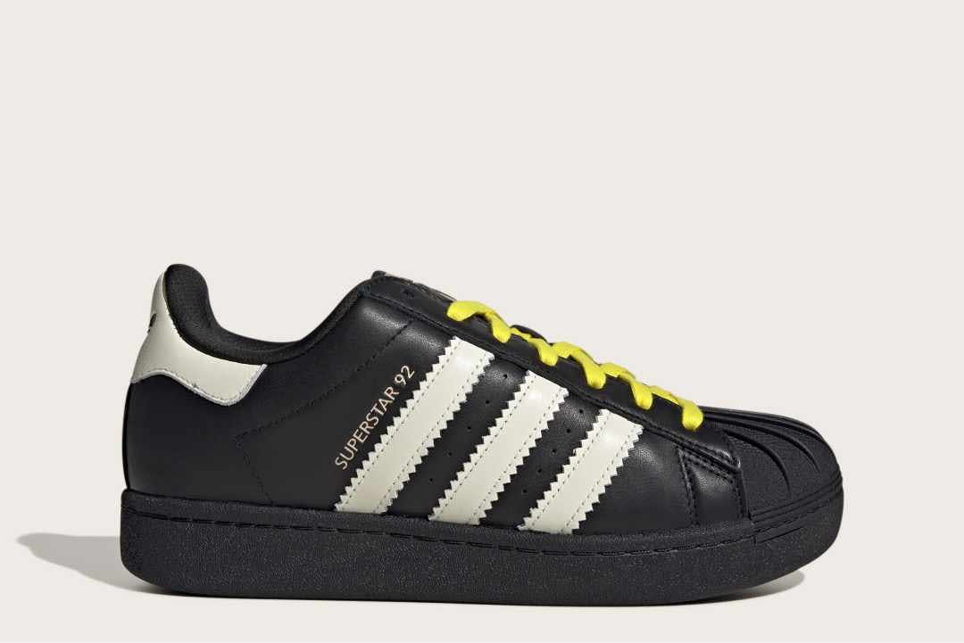 pharrell adidas superstar 92 sneaker in white and black leather modeled by clipse