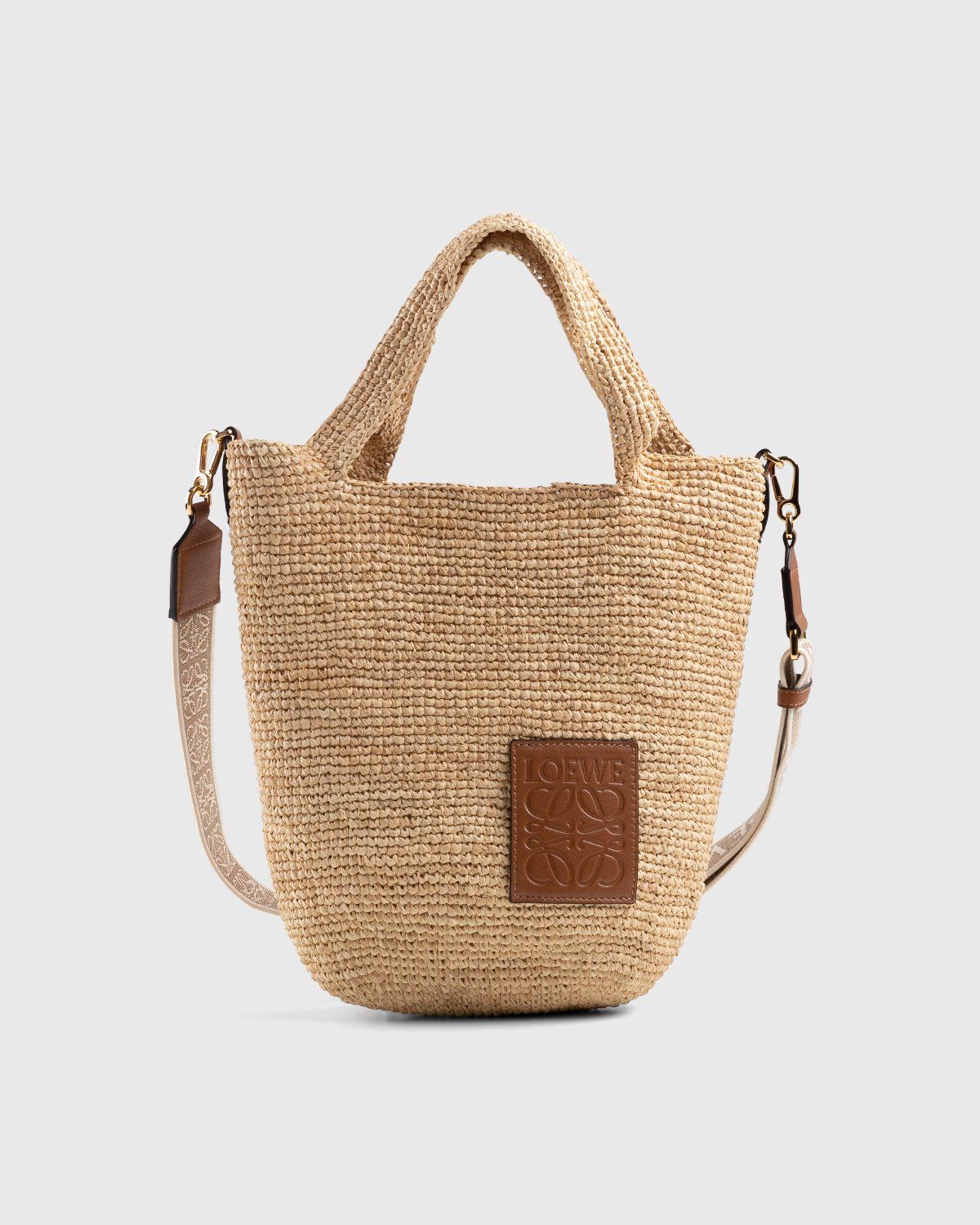 Shop LOEWE Drawstring bucket bag in palm leaf and calfskin