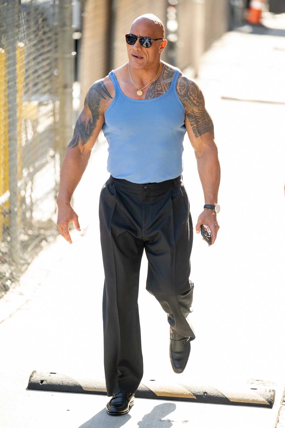 The Rock's Baby Blue Tank Top & Big Pants Outfit Is His Best Ever