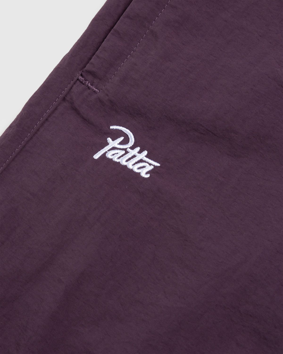 Patta – Basic Nylon M2 Track Pants Plum Perfect | Highsnobiety Shop