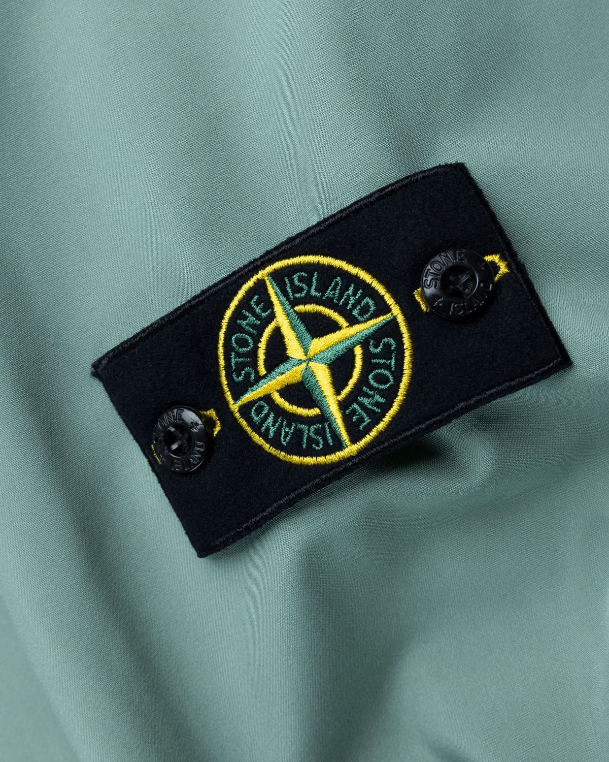 Stone island soft sale shell badge hooded jacket