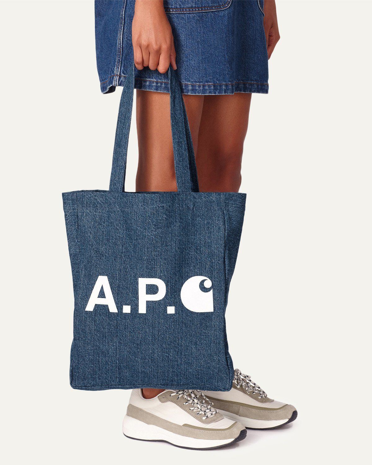 Commonwealth PH - The Alan Tote Bag in Khaki by Carhartt WIP x A.P.C.  features a large contrasting Carhartt x A.P.C. logo on cotton twill, and is  meant to be carried on